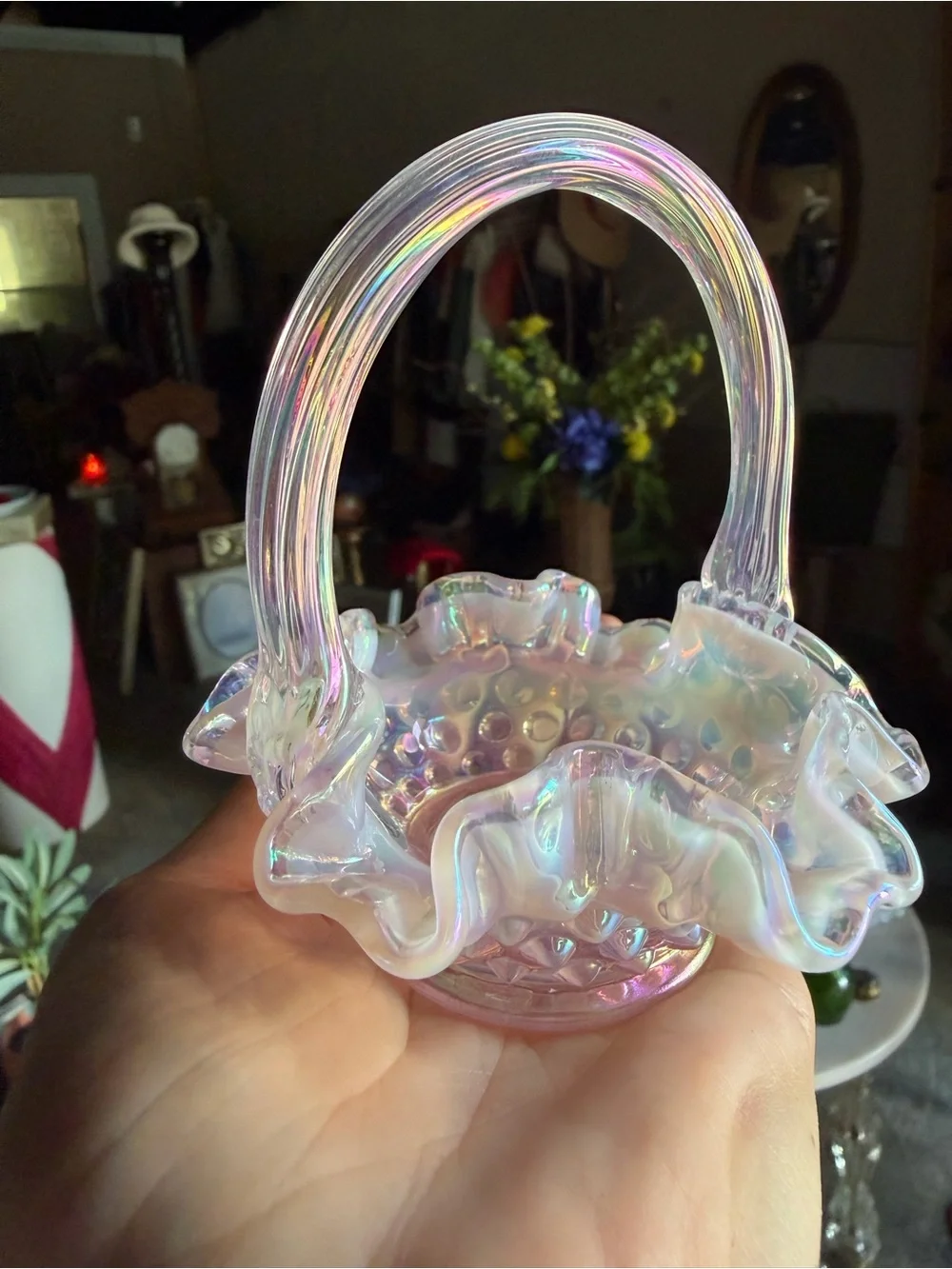 vintage Fenton pink iridescent opalescent glass basket with a ruffled rim and te